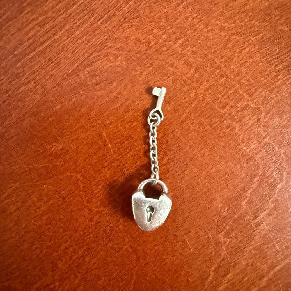 Pandora silver key to my heart charm.